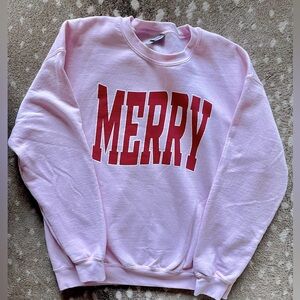 Light Pink Sweatshirt with Large Red “Merry”
